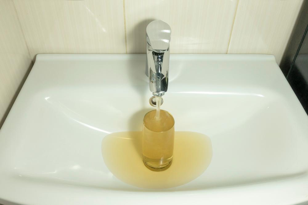 A bathroom tap of contaminated water