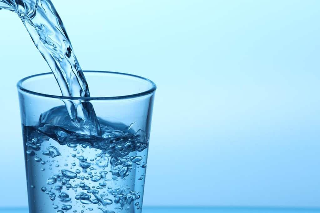 A cold glass of water from a temperature-controlled water dispenser